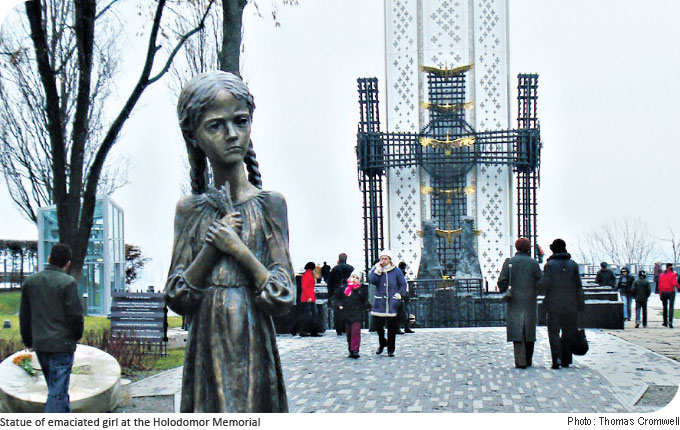 Statue of emaciated girl at the Holodomor Memorial