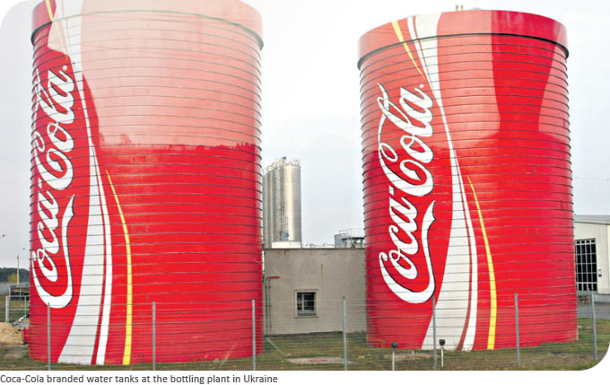 Coca-Cola branded water tanks at the bottling plant in Ukraine